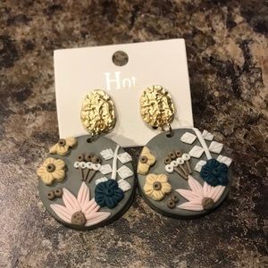 Cute clay earrings new with tag. New in package